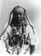 Click to see details of an ethiopian woman wearing elaborate...