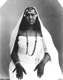 Click to see details of a sudanese woman displaying ritual...