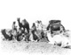 Click to see details of a group of men with camels. [perhaps...
